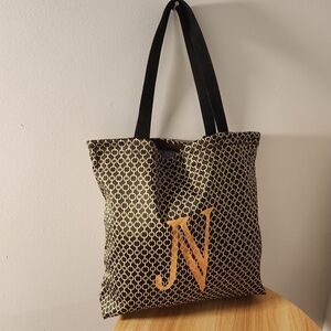 Elegant Black and Gold Patterned Tote Bag
